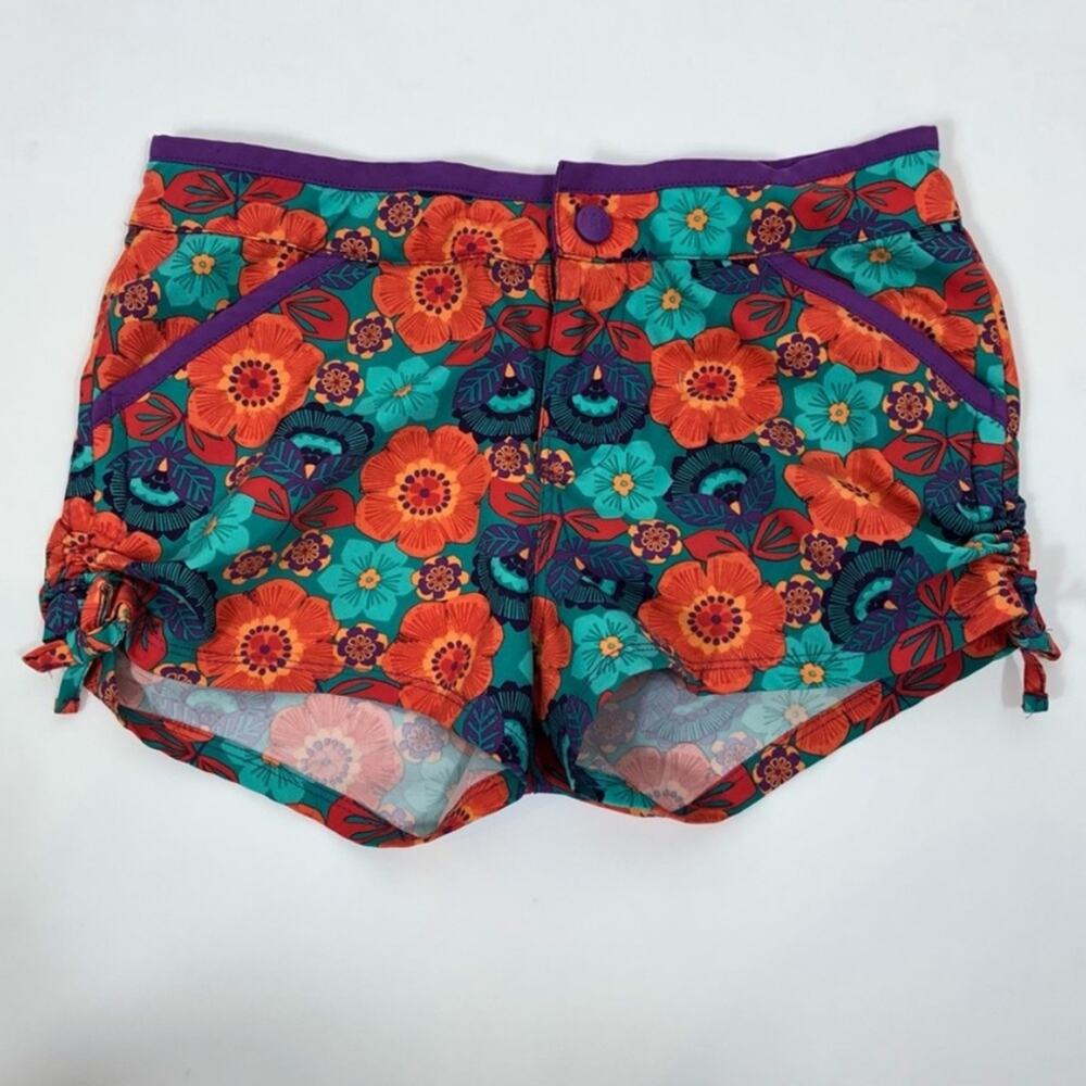 REI girls green and orange floral print shorts